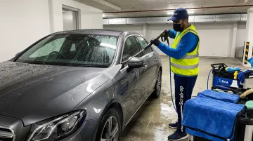 ScrubUp mobile car wash technician steam cleaning ceramic coated vehicle