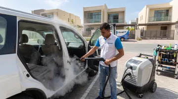 ScrubUp technician performing mobile steam wash on car upholstery in Dubai