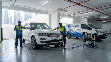 ScrubUp mobile car wash team cleaning vehicle in Dubai residential parking