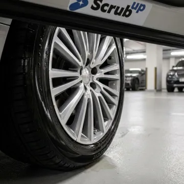 Glossy clean car tyres after mobile detailing