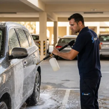Mobile car wash service for a family car in Dubai