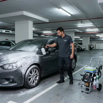 Mobile car wash service in Dubai parking area