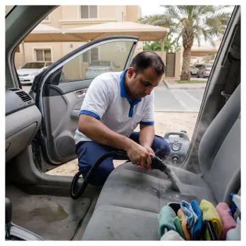 Mobile car cleaning technician deep cleaning a vehicle interior
