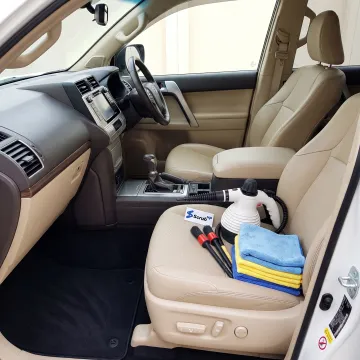 Clean detailed car cabin with professional tools