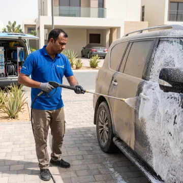 Foam pre-wash being applied to a vehicle
