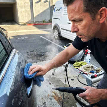 Mobile technician detailing a clean vehicle