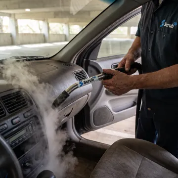 Steam cleaning a vehicle interior
