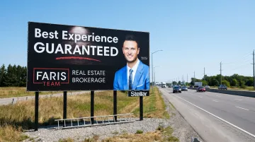 Real estate billboard advertisement on busy roadside showing agent branding and tagline