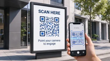 Billboard advertisement with prominent QR code prompting smartphone scanning for promotional offer
