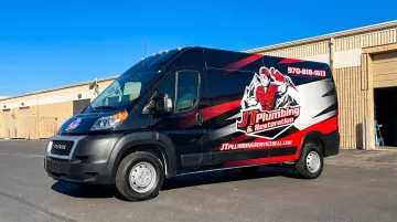 Fleet vehicle wrap showing clean vibrant vinyl graphics after years of professional maintenance