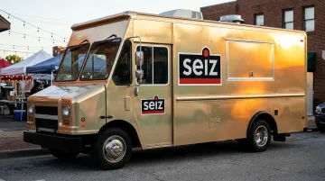Food truck with glossy metallic gold vinyl wrap