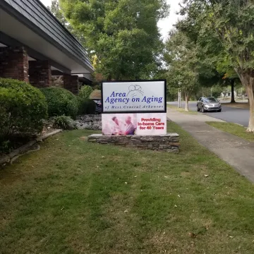 A professionally repaired monument sign standing proudly in front of a commercial building.