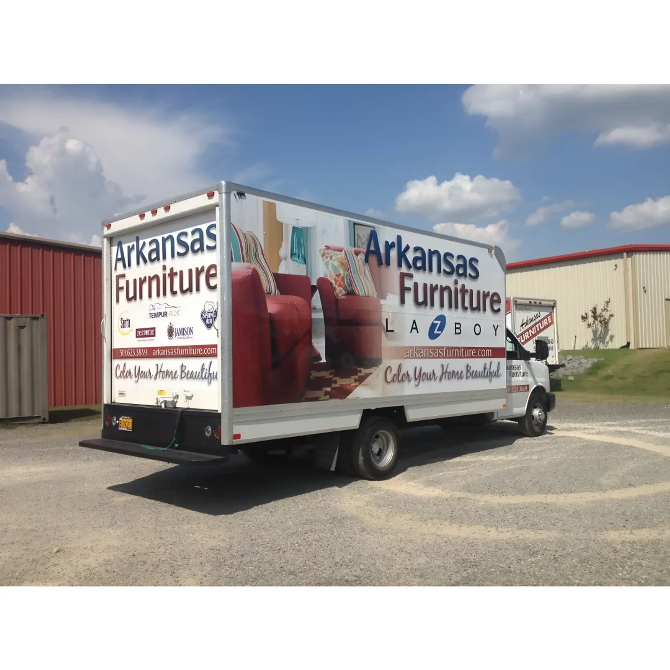 A commercial van with a vibrant custom vehicle wrap applied in Little Rock.