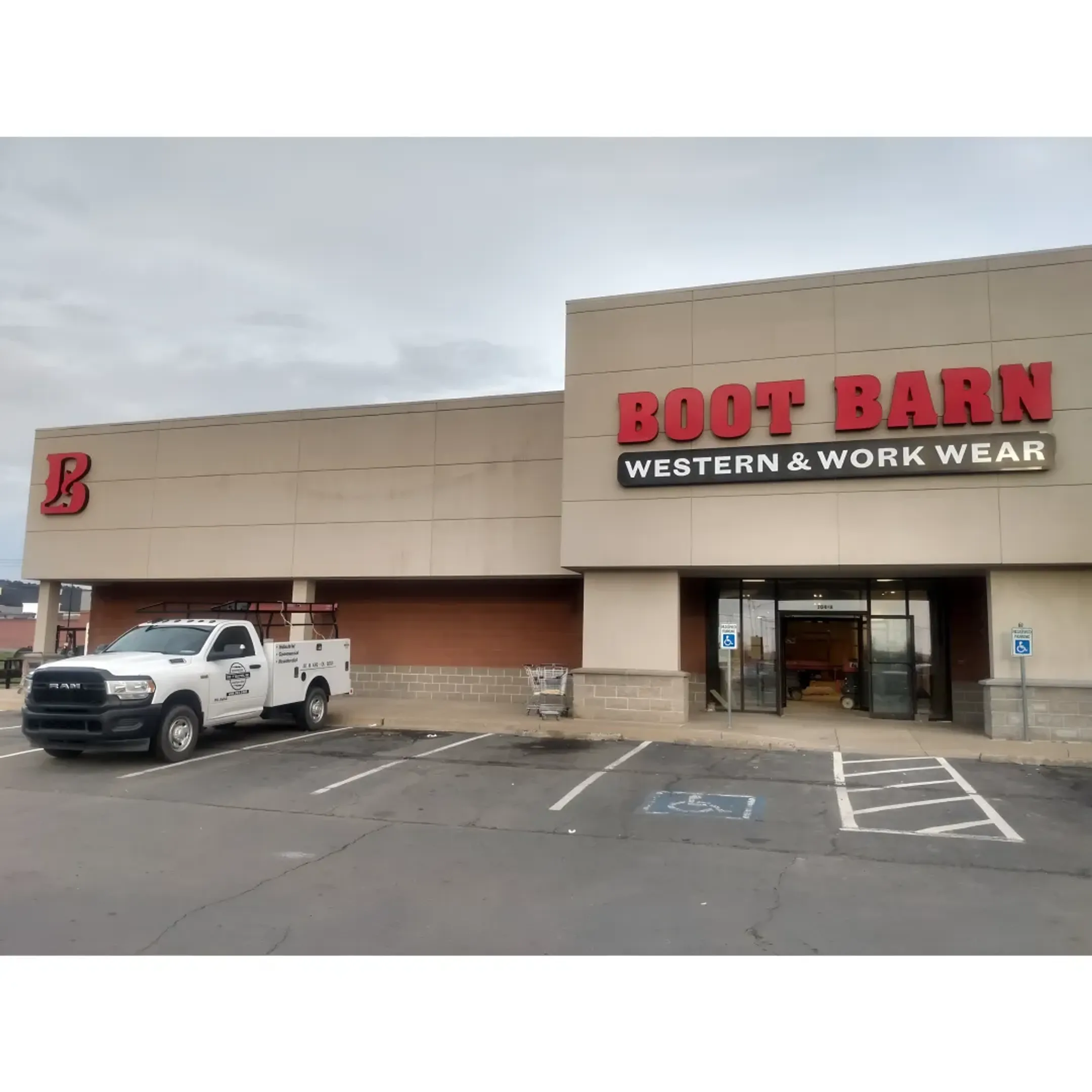 A collection of professionally crafted business signs in a Little Rock commercial district.