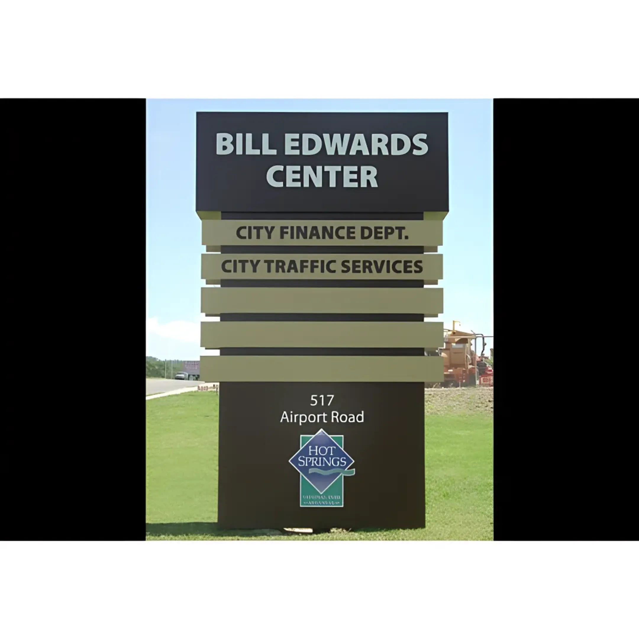 A newly installed modern monument sign for a corporate office park.