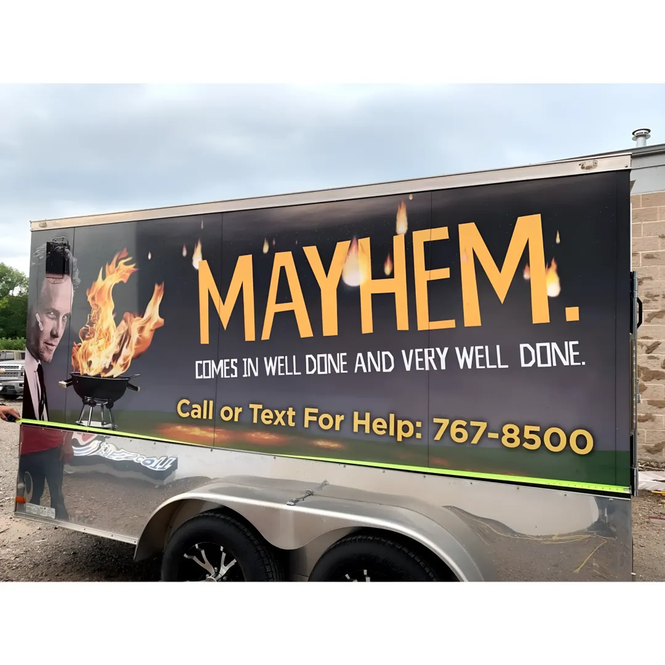 A fleet of branded commercial trucks lined up.