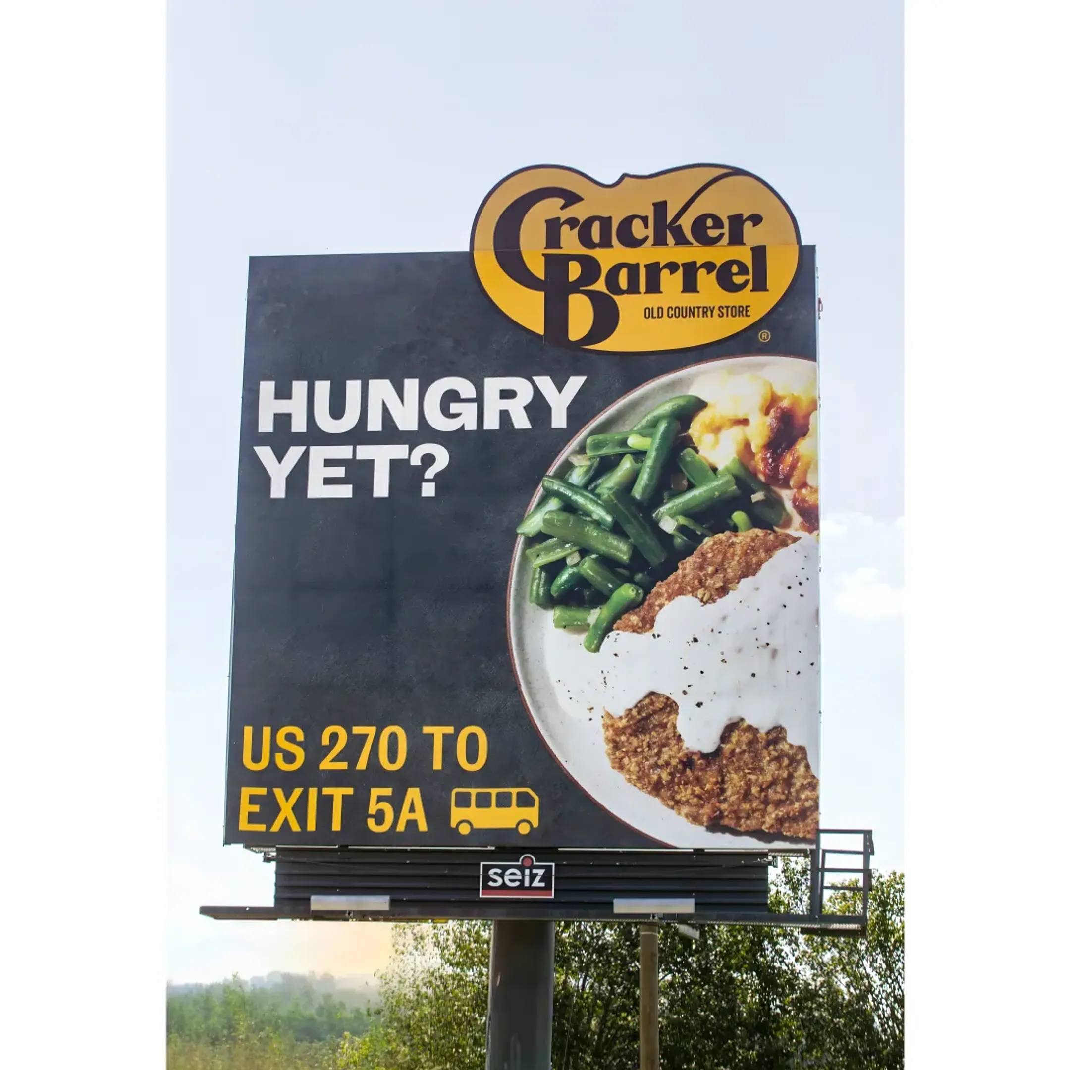 Roadside billboard advertising for a local business