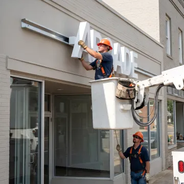 Custom storefront sign installation in Jonesboro, AR