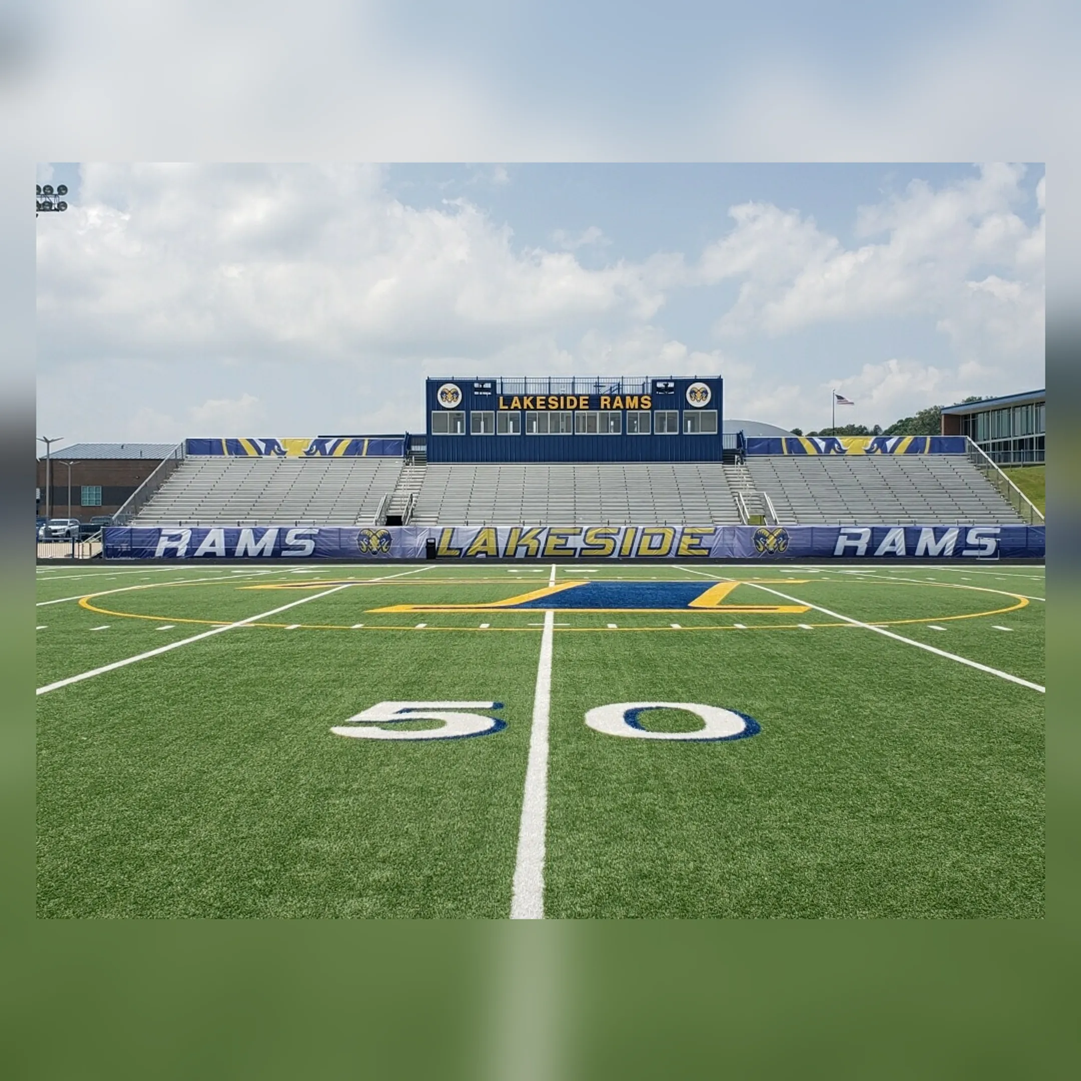 A new digital scoreboard installed at a high school football stadium.