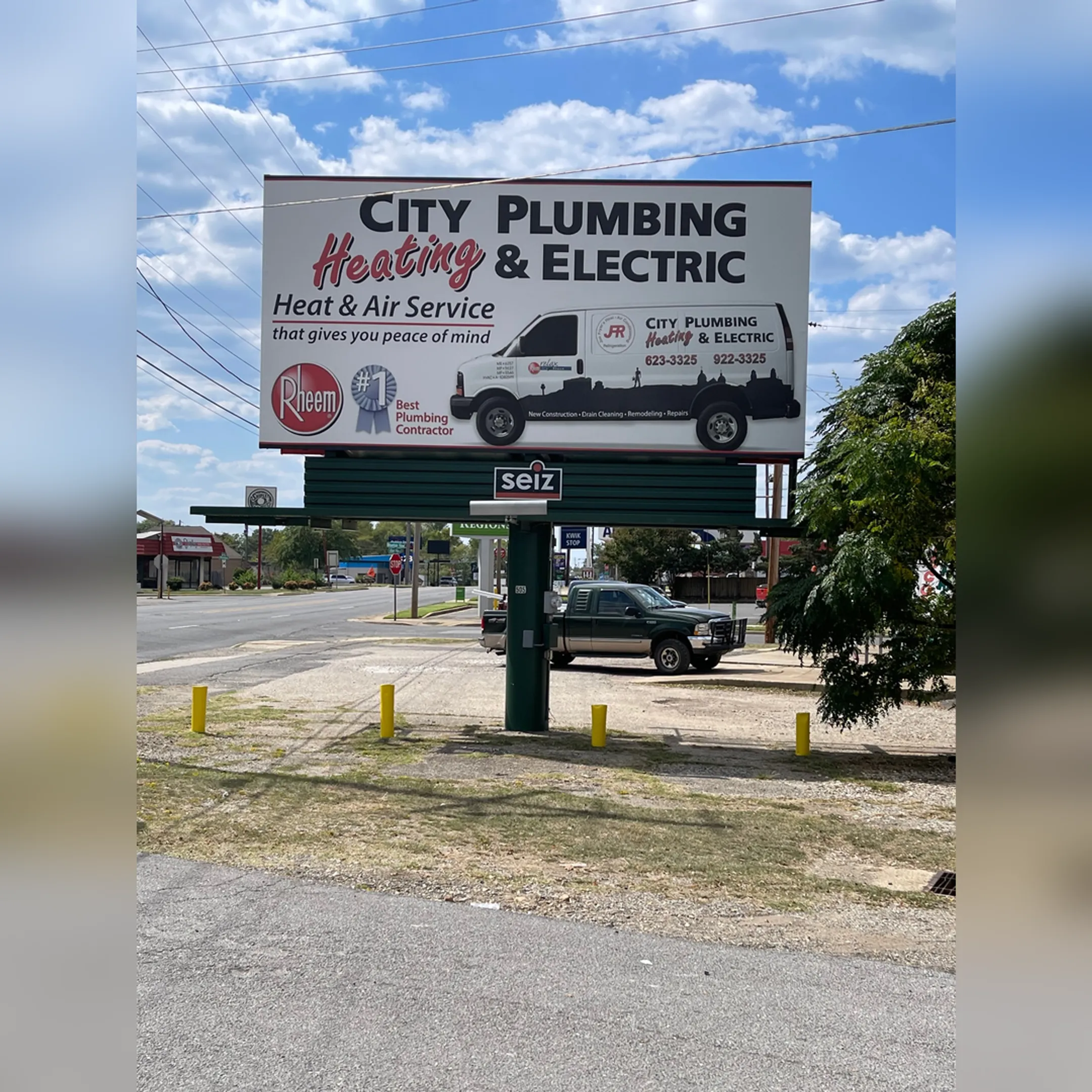A large, newly installed billboard on a highway in Arkansas.