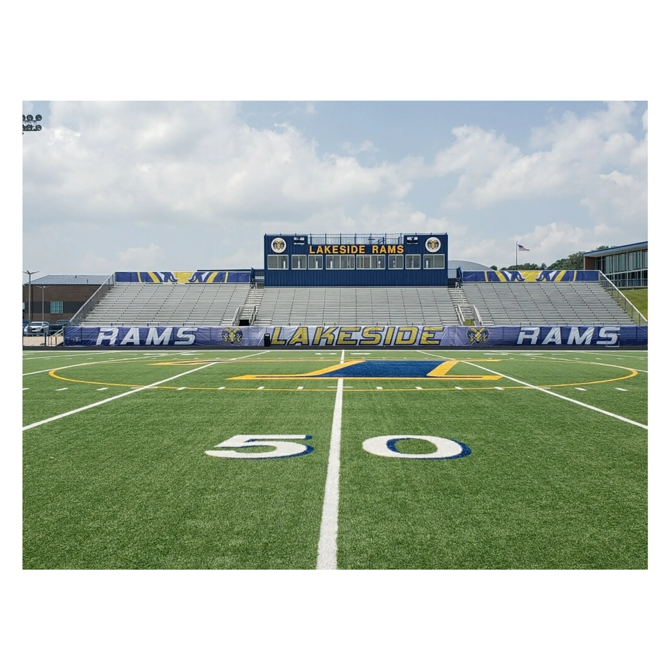 A new digital scoreboard installed at a high school football stadium.