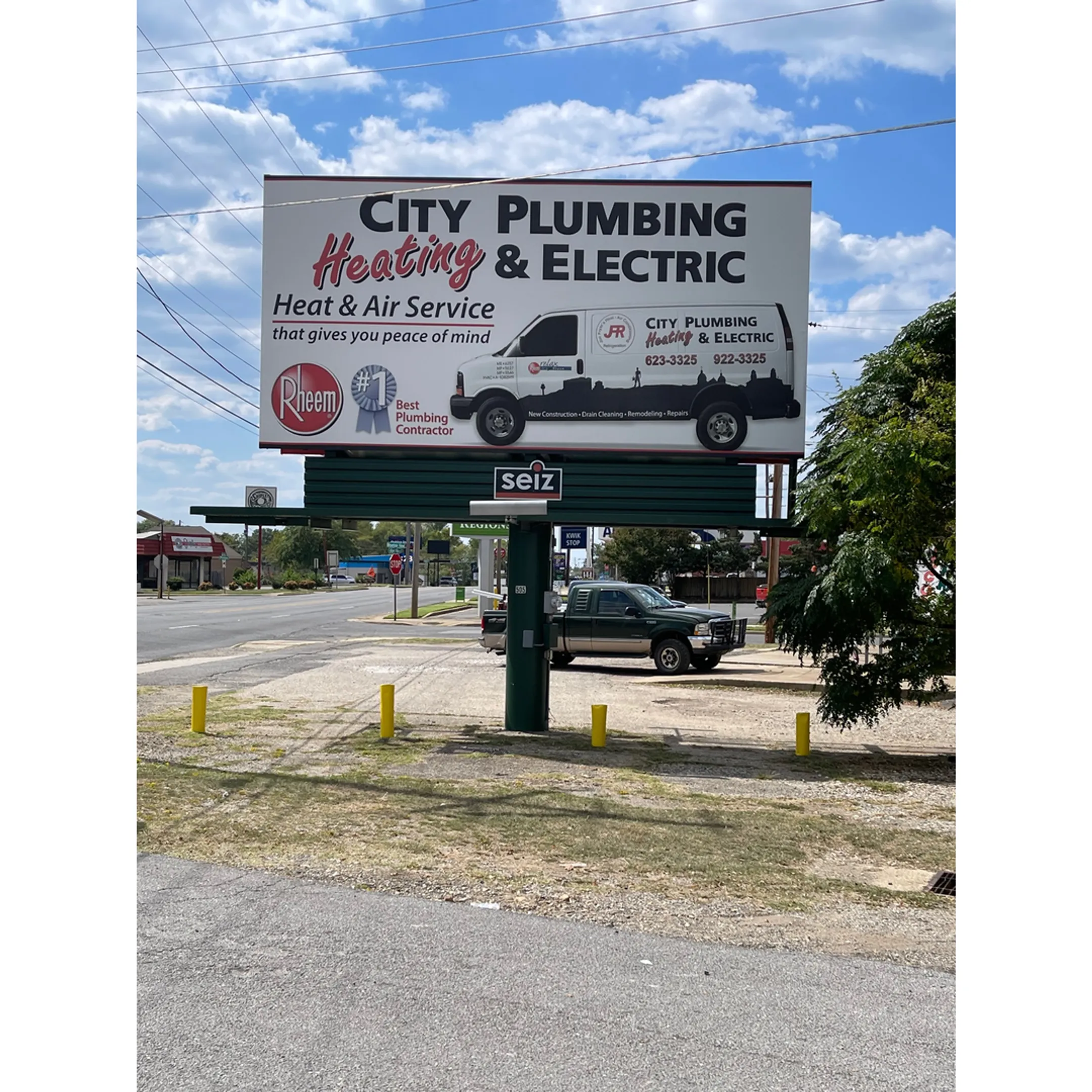 A large, newly installed billboard on a highway in Arkansas.