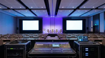 Modern event venue interior showcasing AV systems specialty lighting and staging infrastructure