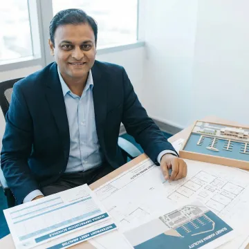 Engineer reviewing cost segregation report documents for a marina property