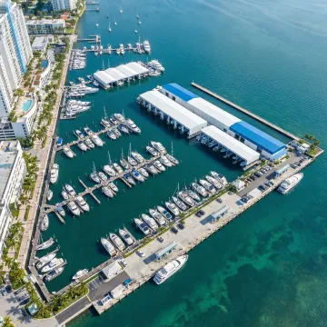 Aerial view of a marina with boat slips, docks, and waterfront facilities representing cost segregation services