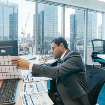 Cost segregation study expert reviewing property depreciation schedules in Wisconsin