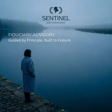 Fiduciary financial advisor explaining investment strategy with charts and graphs