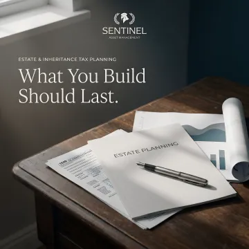 Financial advisor reviewing estate tax planning documents with client