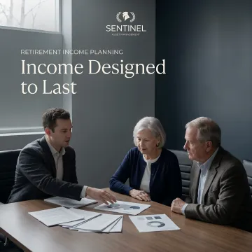 Senior couple reviewing personalized retirement income plan with financial charts