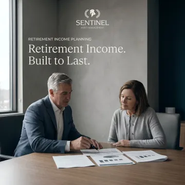 Financial advisor guiding retirement income planning process with charts and documents