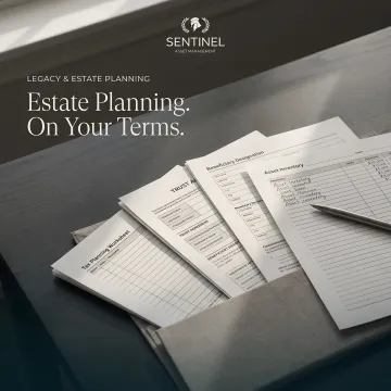 Estate planning documents with trust agreements and tax strategy materials on desk
