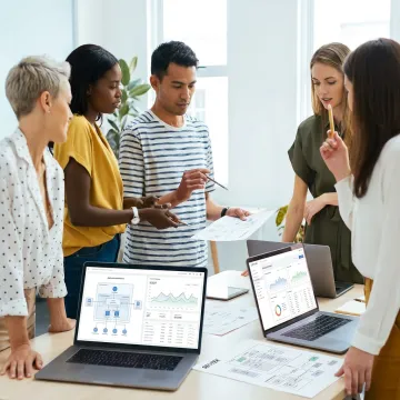 Enterprise applications consulting team reviewing systems strategy