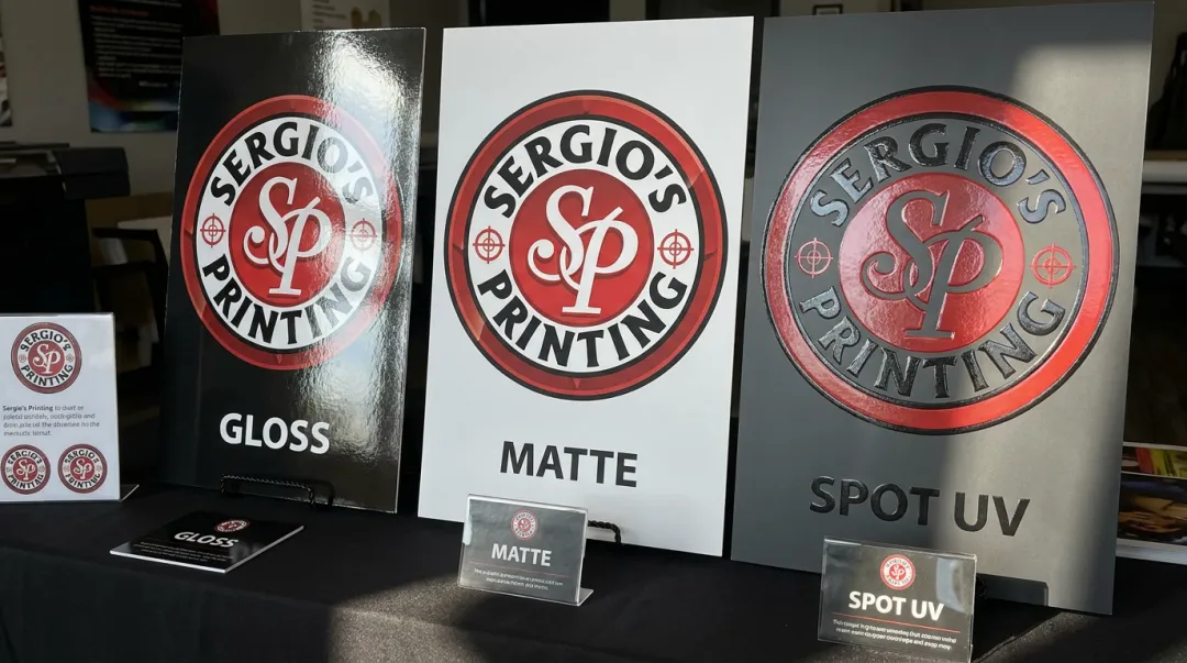 Sergio's Printing poster finish options gloss matte and spot UV displayed side by side