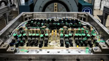 Industrial PCB mounted in vibrating mechanical equipment showing board thickness and mounting hardware