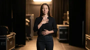 Speaker practicing diaphragmatic breathing techniques before public presentation