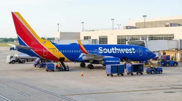 Southwest Airlines aircraft at gate representing point-to-point route strategy