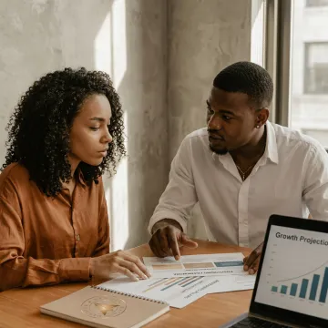 Strategist coaching a founder on brand positioning