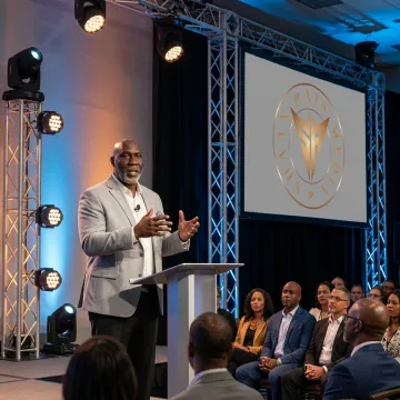 Keynote speaker presenting to a business audience