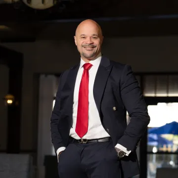 Business coach guiding founder through brand positioning strategy