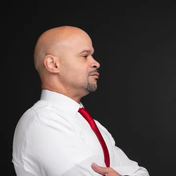 Distinguished speaker presenting to a business audience