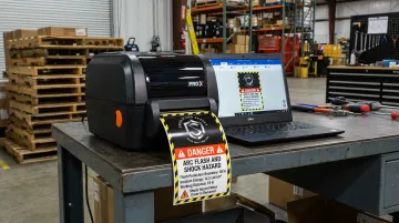 LabelTac Pro X arc flash label printer producing ANSI-formatted compliance labels