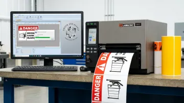 LabelTac 9 industrial label printer producing wide format QR code label