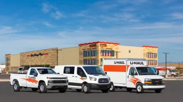U-Haul full-service moving center exterior with truck fleet and storage facility