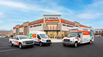 Full-service U-Haul Moving and Storage center exterior with truck fleet and signage