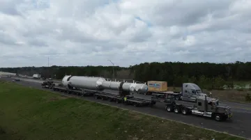 Sims Global Solutions heavy haul trucking fleet operating alongside carrier network