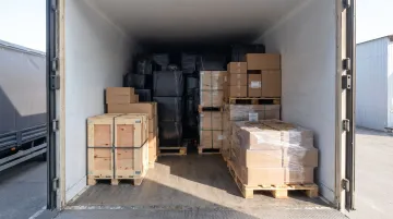 LTL trailer interior loaded with multiple shippers pallets side by side